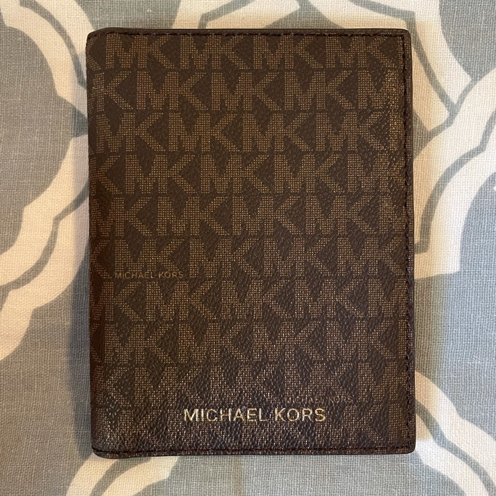 Michael Kors passport wallet.